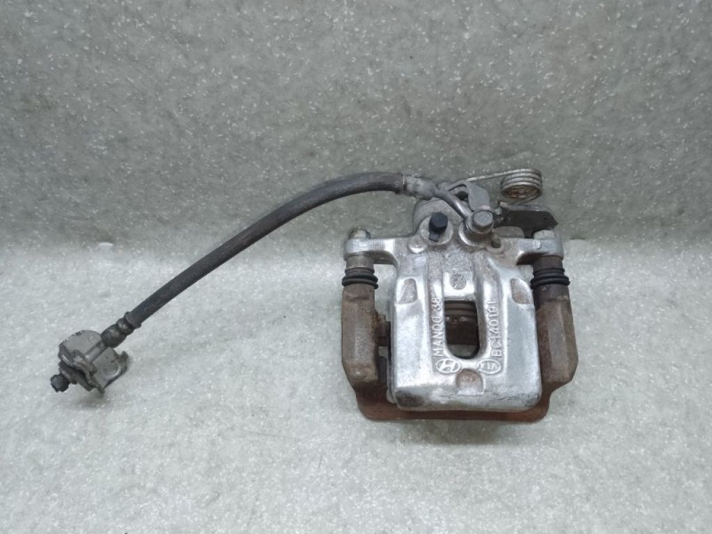 58210-3X300 | Супорт гальмівний задн. лів. HYUNDAI ELANTRA MD 10-15