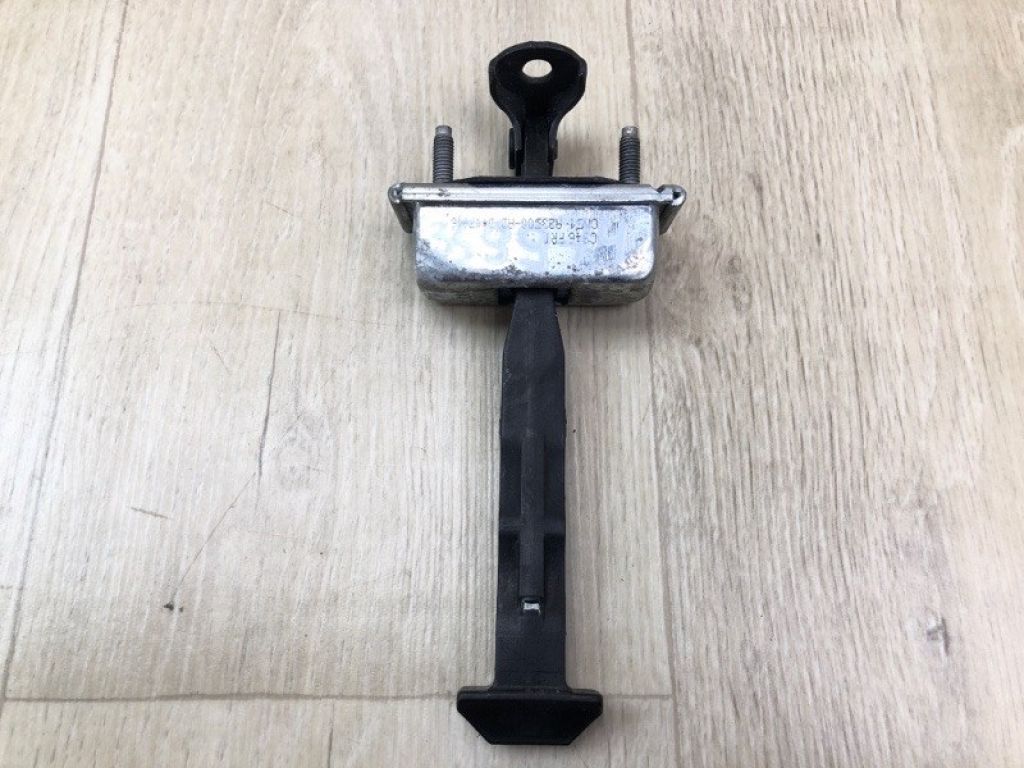 CP9Z-5823500-A | Обмежувач дверей передн. прав. FORD FOCUS 10-18