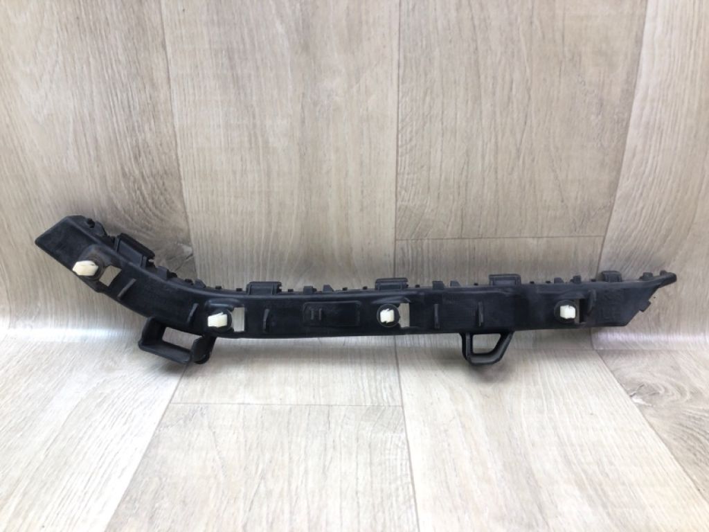 86613A7000 | Кронштейн заднього бампера лів. KIA FORTE YD 12-