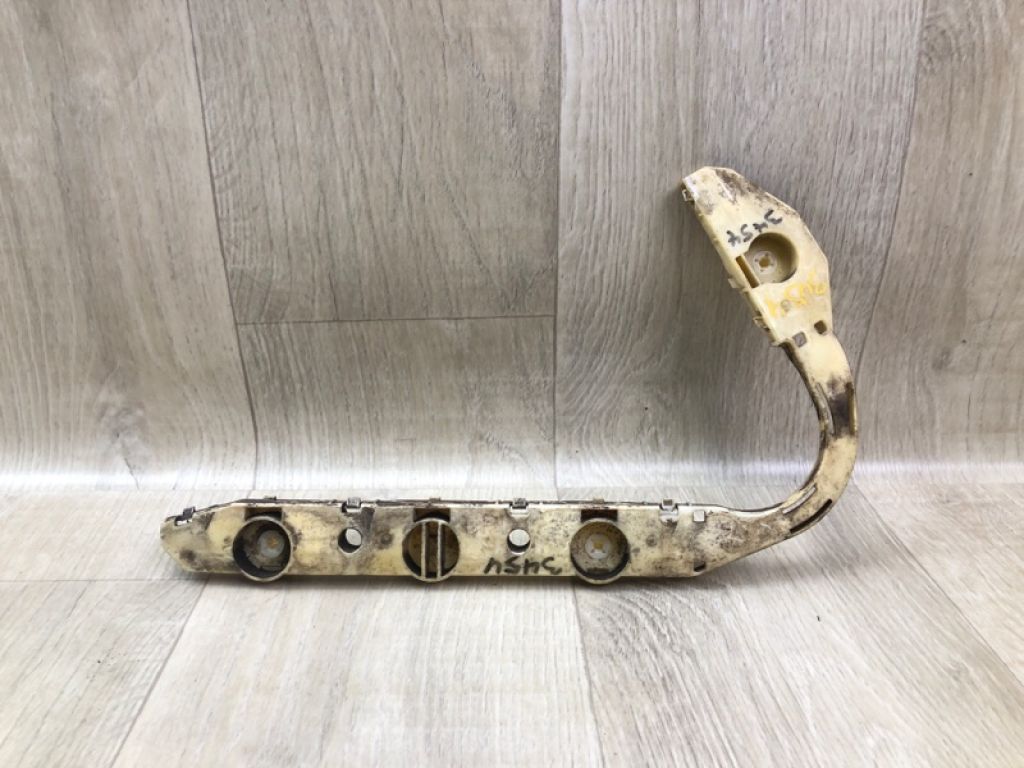 85221JM000 | Кронштейн заднього бампера лів. NISSAN ROGUE 08-15