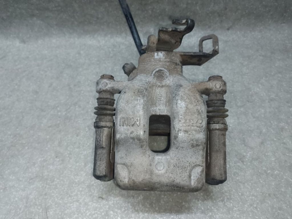 34219804731 | Супорт гальмівний задн. лів. MINI COUNTRYMAN R60 10-16