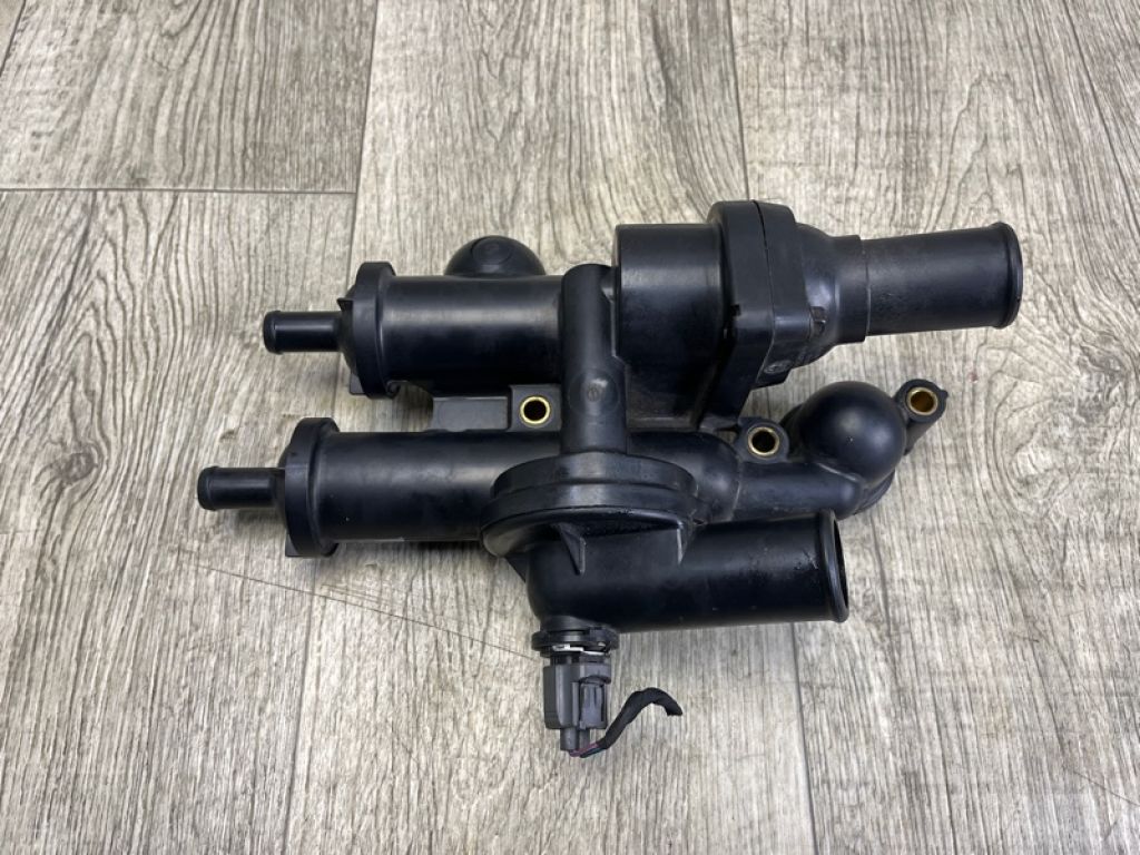 68003582AA | Корпус термостату DODGE CALIBER 06-11