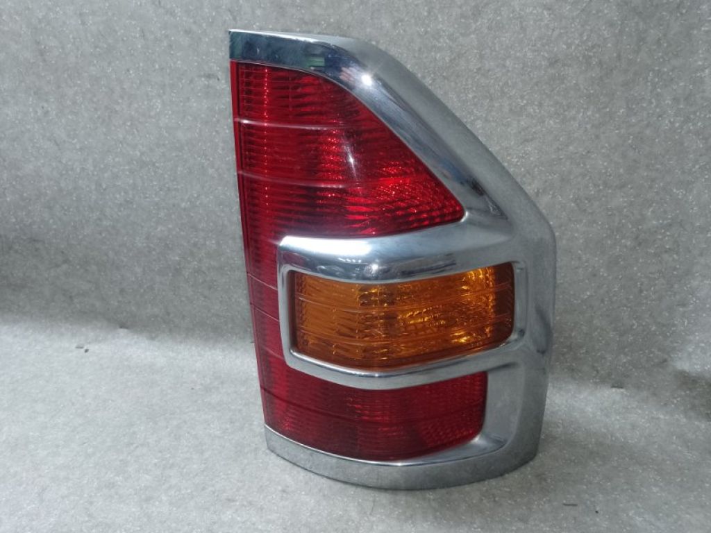 MR563838 | Ліхтар зовнішній прав. MITSUBISHI PAJERO 99-06