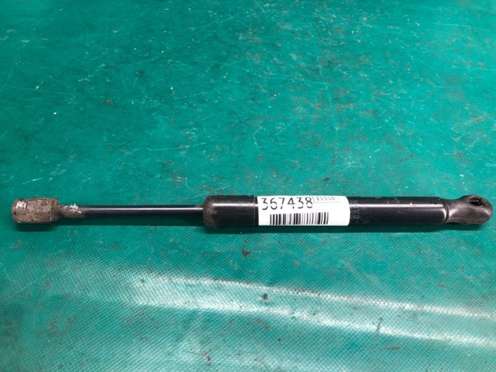 DA5Z-16C826-A | Амортизатор капоту лів. LINCOLN MKS 12-16