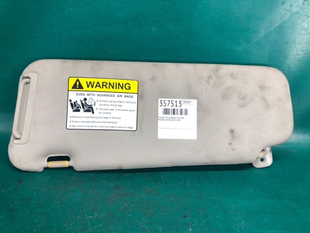 TD11-69-320C 34 | Козирок сонцезахисний лів. MAZDA CX-9 06-16