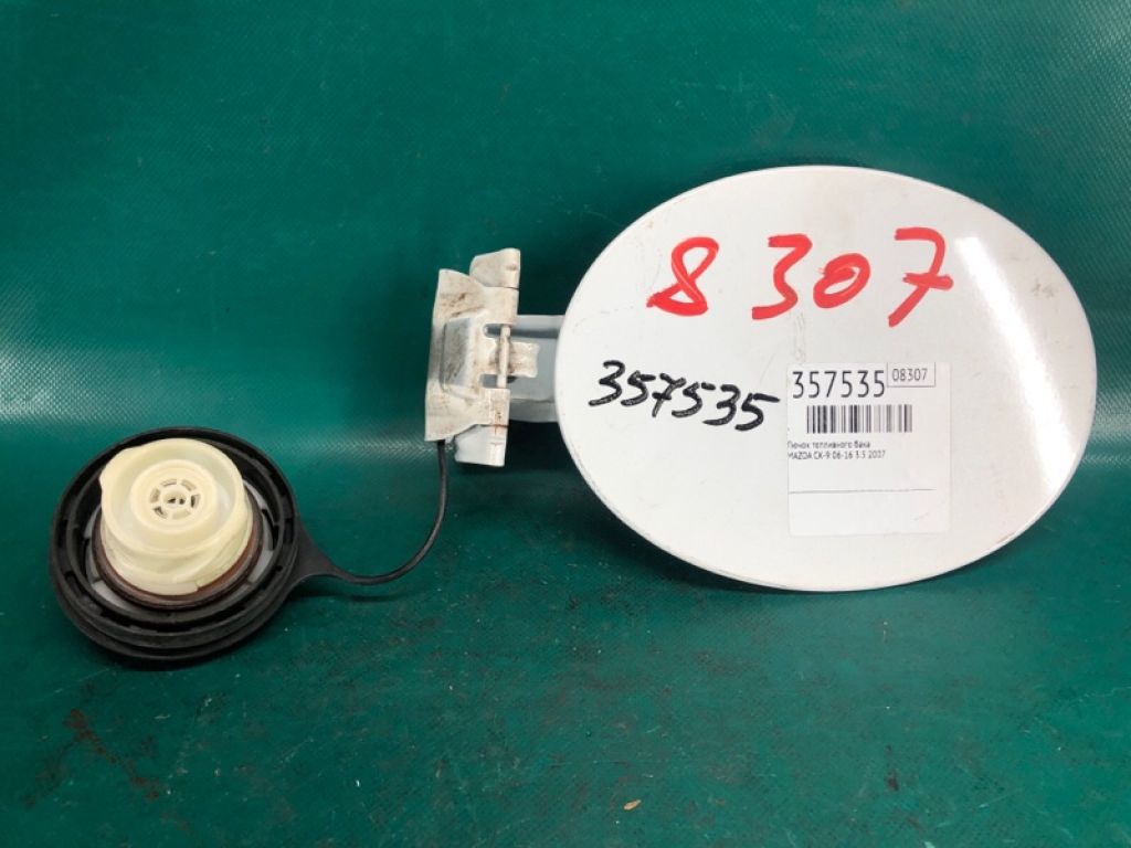 TD11-42-410B | Лючок паливного бака MAZDA CX-9 06-16
