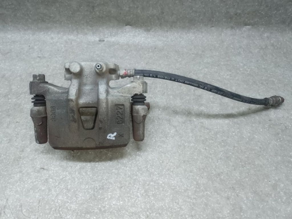 MN116310 | Суппорт тормозной задний правый MITSUBISHI OUTLANDER XL 05-13