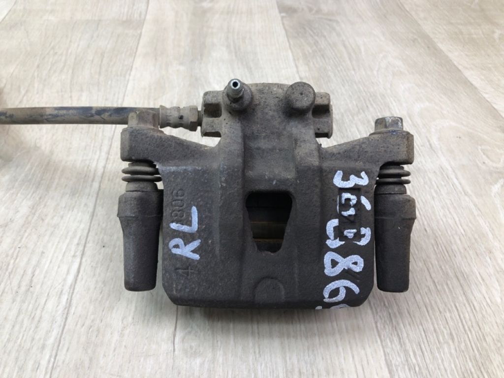 MN116309 | Супорт гальмівний задн. лів. MITSUBISHI OUTLANDER XL 05-13