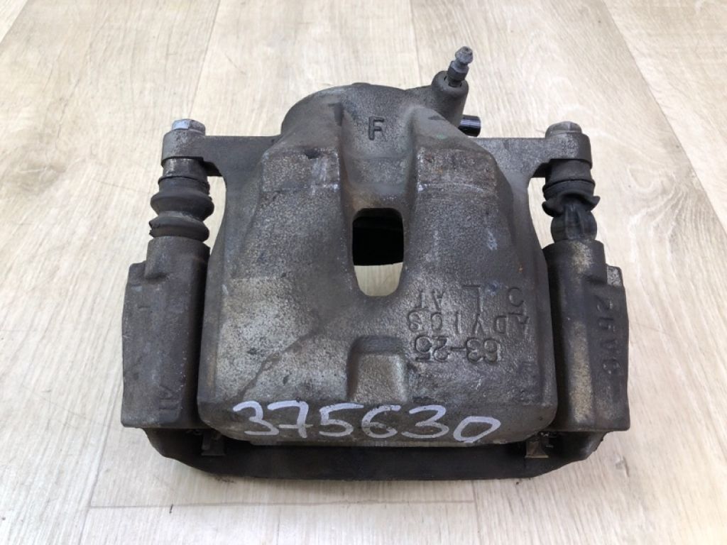 47750-12A70 | Супорт гальмівний передній лівий TOYOTA PRIUS PLUS 11-14
