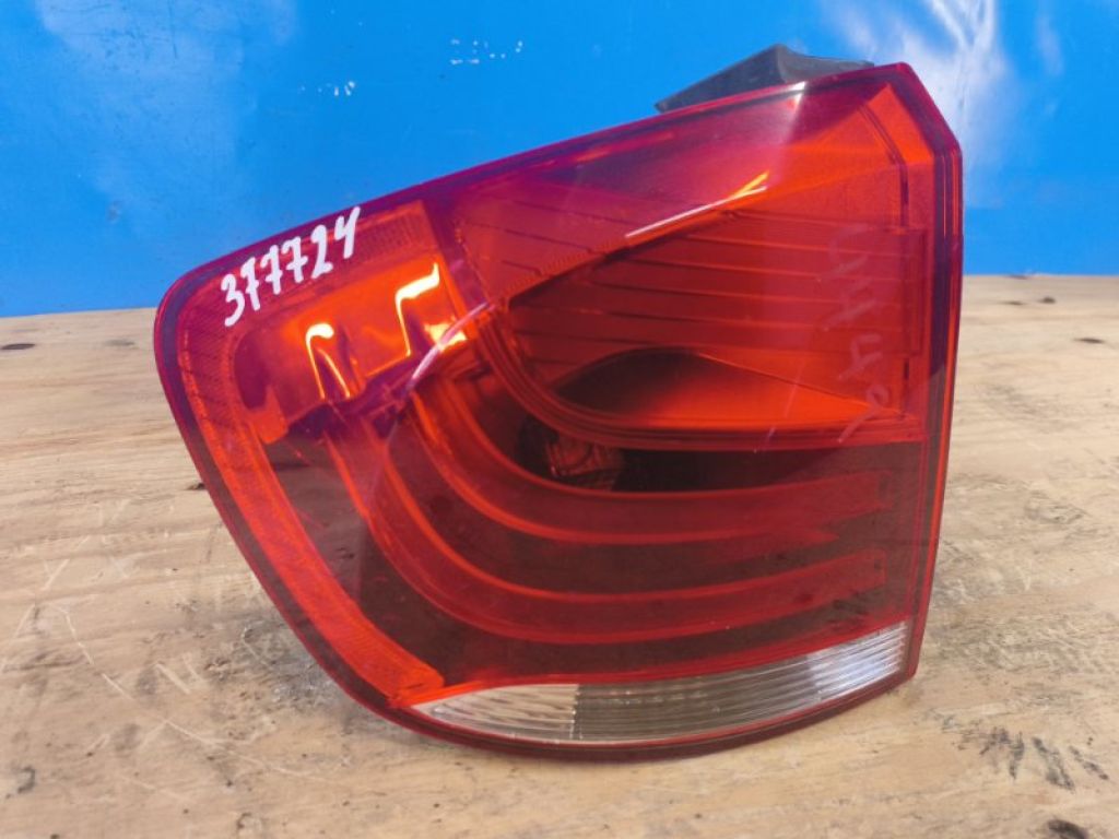 63212990111 | Фонарь наружный левый BMW X1 E84 09-