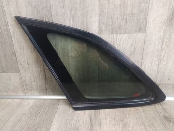 Скло у кузов заднє ліве MAZDA 323 BJ 98-2003