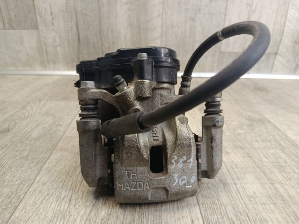 KAY0-26-71XA | Супорт гальмівний задній лівий MAZDA CX-5 (KF) 21-25