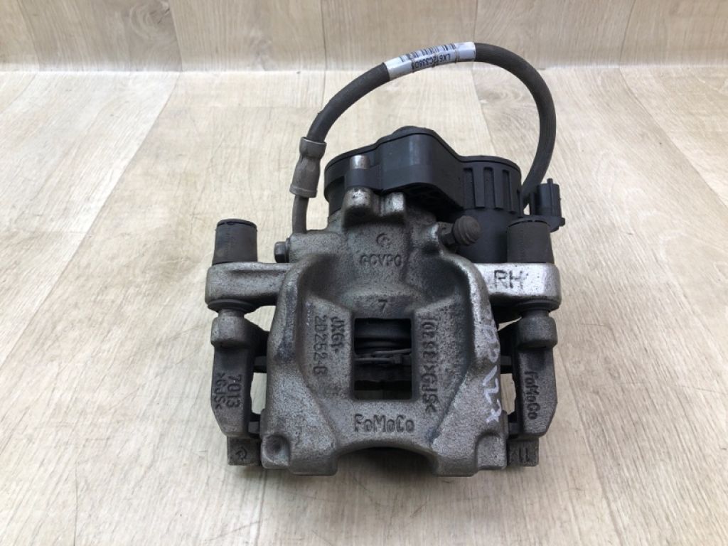 JX6Z-2386-L | Супорт гальмівний задній правий FORD ESCAPE 19 -