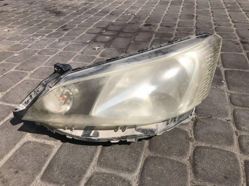 Фара передня ліва NISSAN NV200 EU 09- 26060-BJ10A