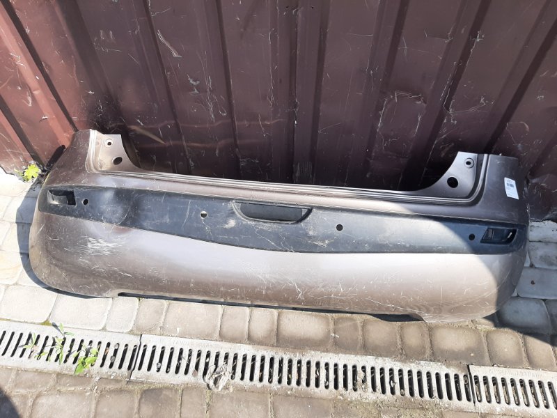 Бампер задній NISSAN NOTE 04-12