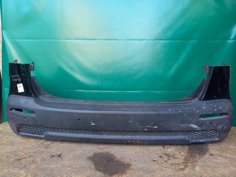 Бампер задній KIA SORENTO XM 09-14 866101U010