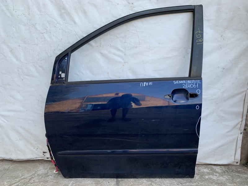 Двері передні ліві TOYOTA SIENNA 03-10 67002-AE021