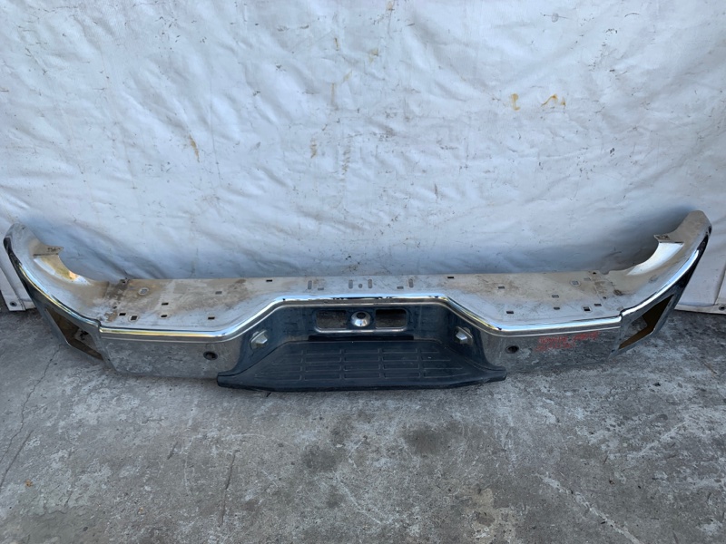 Бампер задній INFINITI QX56 / TITAN / ARMADA 04-16 85010-7S005 — 2