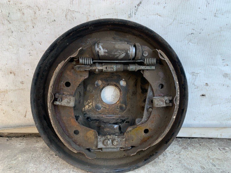 Гальмівний механізм лівий NISSAN VERSA B17 11-19 44010-3BA5B