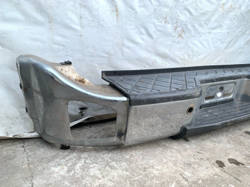 Бампер задній NISSAN QX56 / TITAN / ARMADA 04-16 85010-7S005 — 3