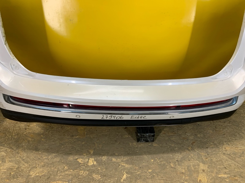 Бампер задній FORD EDGE 15- GT4B-17F954-V — 3