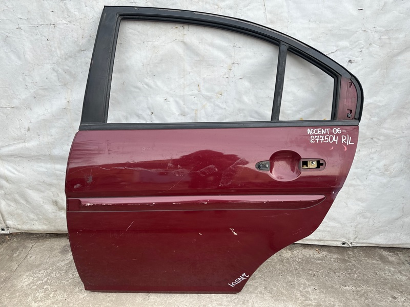 Двері задні ліві HYUNDAI ACCENT MC 06-10 77003-1E020