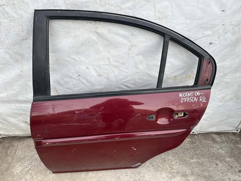 Двері задні ліві HYUNDAI ACCENT MC 06-10 77003-1E020 — 2