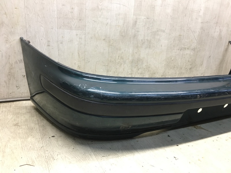 Бампер задній SUBARU IMPREZA 92-00 57720FA051 — 2