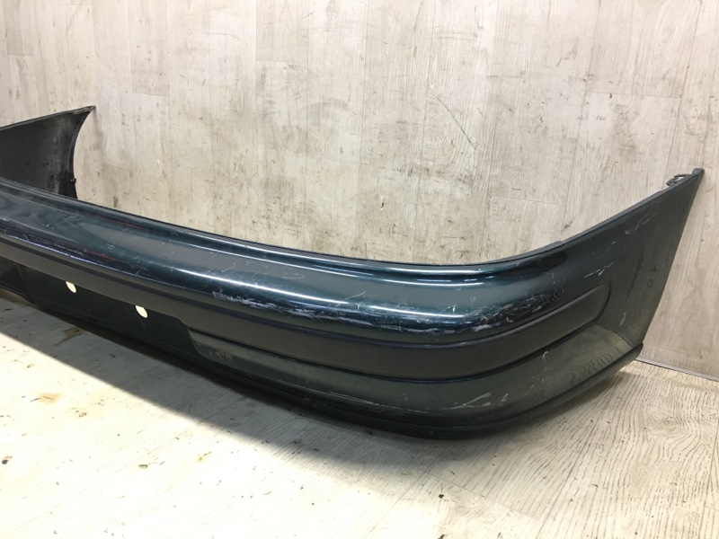 Бампер задній SUBARU IMPREZA 92-00 57720FA051 — 3
