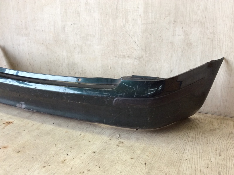 Бампер задній MAZDA 323 BJ 98-2003 B25H-50-221B AA — 4