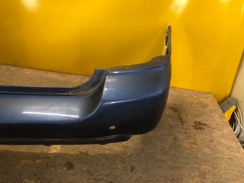 Бампер задній SUBARU FORESTER SG 02-07 5770SA010 — 5