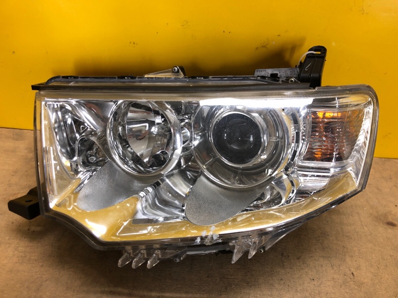 Фара ліва MITSUBISHI PAJERO SPORT 09-17 8301A877