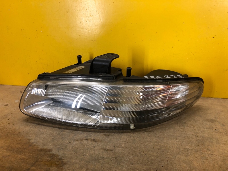 Фара ліва CHRYSLER VOYAGER 95-00 4897 389AC