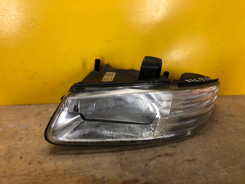 Фара ліва CHRYSLER VOYAGER 95-00 4897 389AC — 3